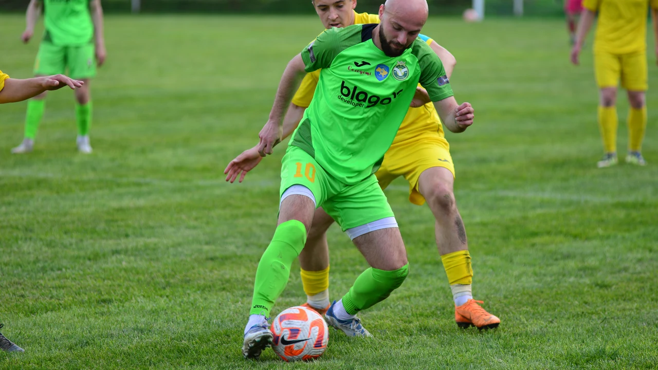 Soccer players competing for the ball